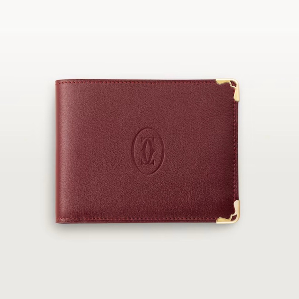 Cartier
 Bifold Leather Wallet with Gold Accents excellent condition like you